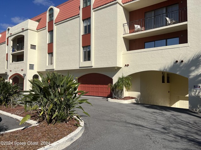 view of building exterior with a garage