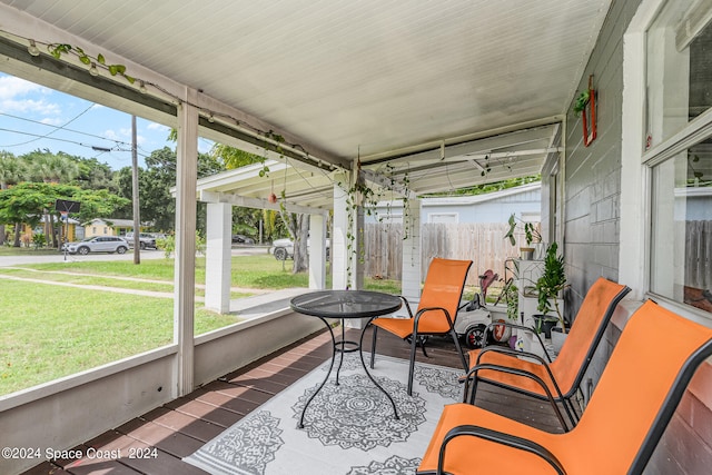 sunroom featuring a healthy amount of sunlight