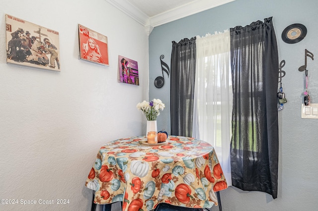 dining room with crown molding