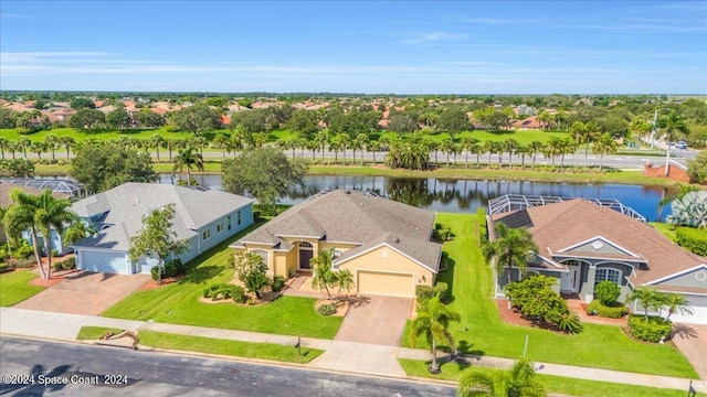 drone / aerial view featuring a water view