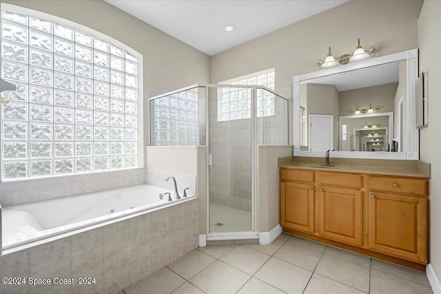 bathroom with vanity, separate shower and tub, and tile patterned floors