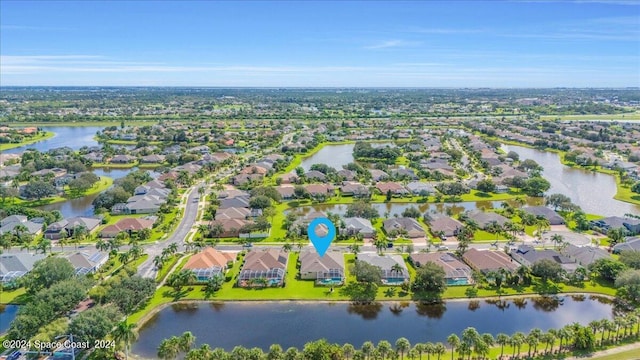 drone / aerial view with a water view