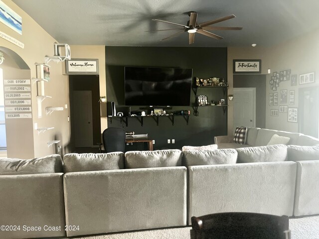 living room with ceiling fan