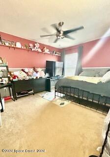 bedroom with carpet and ceiling fan