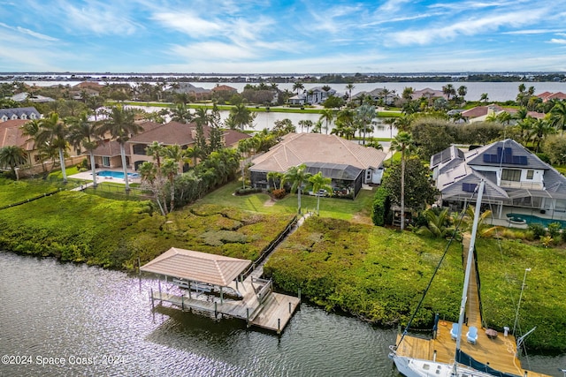 drone / aerial view with a water view