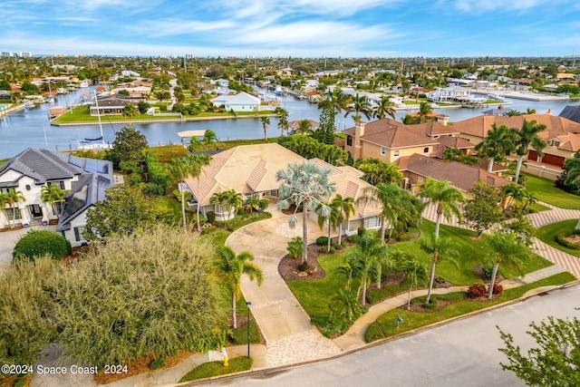 birds eye view of property featuring a water view