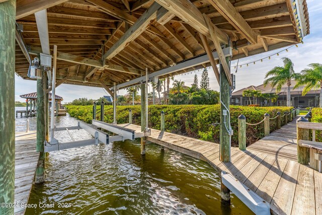 view of dock with a water view