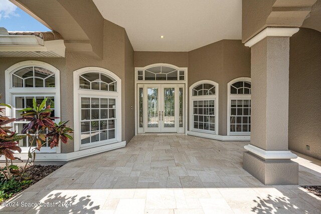 doorway to property with french doors and a patio