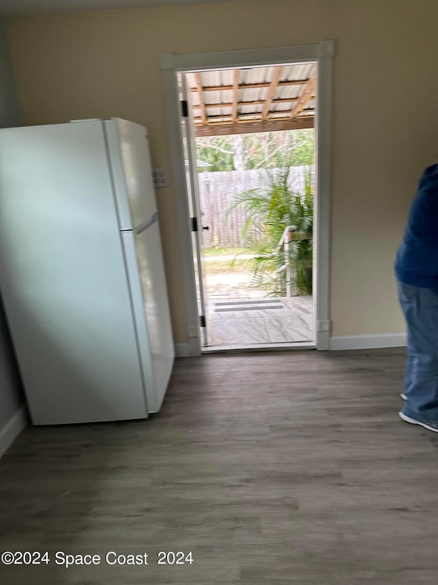 doorway to outside with hardwood / wood-style floors