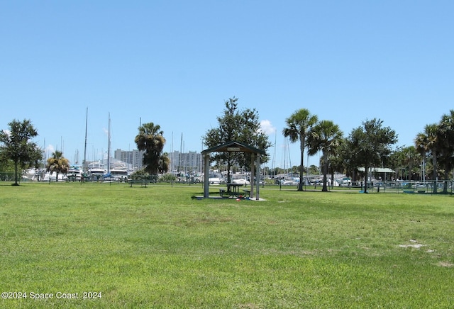 surrounding community featuring a gazebo and a yard