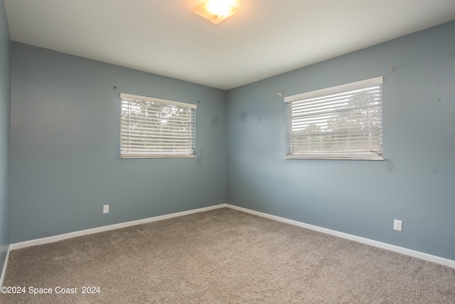 view of carpeted spare room