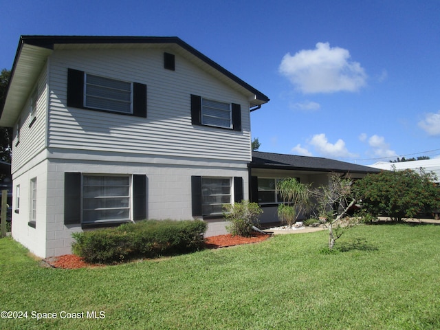 exterior space with a lawn