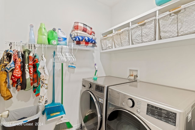 washroom with independent washer and dryer