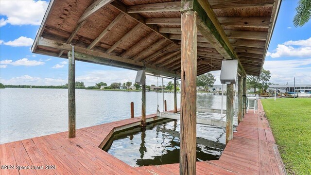 view of dock with a water view