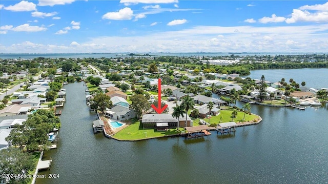 bird's eye view with a water view