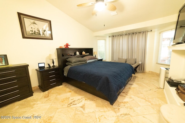 bedroom featuring lofted ceiling and ceiling fan