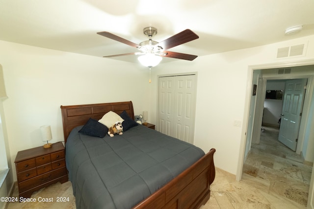 bedroom featuring a closet and ceiling fan