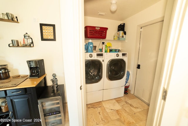 washroom featuring independent washer and dryer