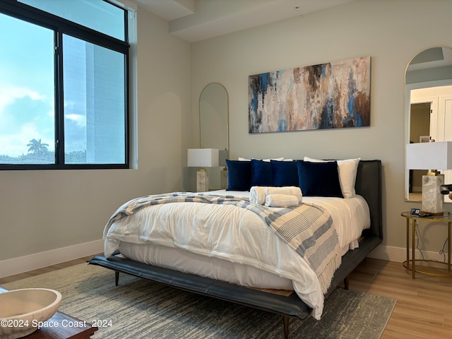 bedroom featuring hardwood / wood-style flooring