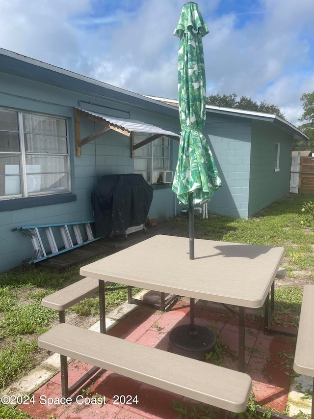 view of patio with a grill