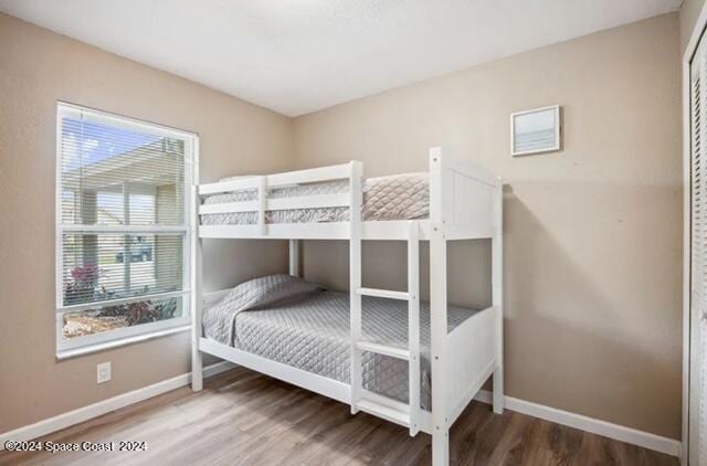 bedroom featuring hardwood / wood-style flooring