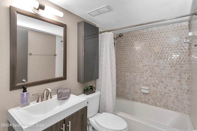 full bathroom with vanity, toilet, and shower / bath combination with curtain