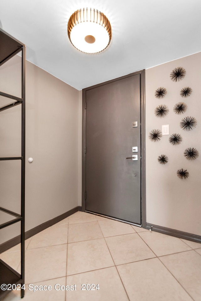 interior space with light tile patterned floors