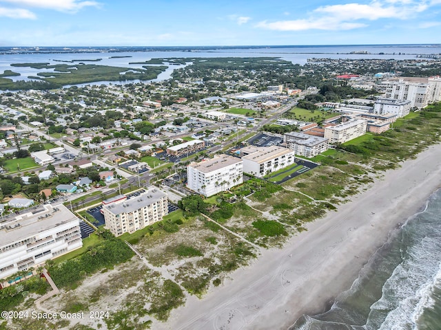 aerial view with a beach view and a water view