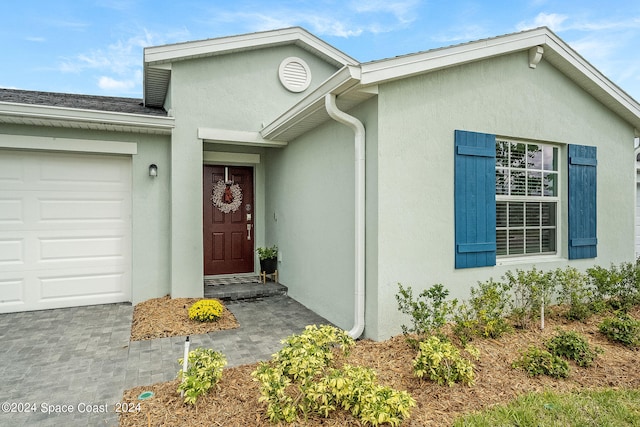 entrance to property with a garage