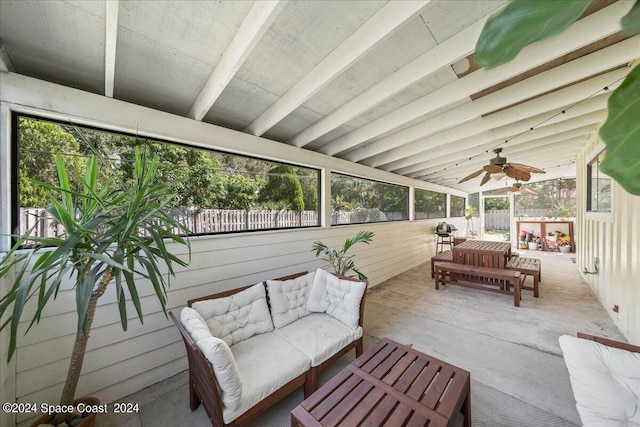 sunroom / solarium with beam ceiling