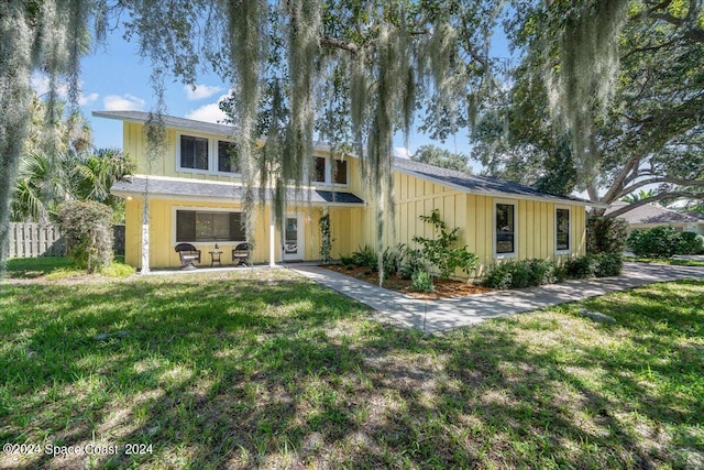 exterior space with a front lawn