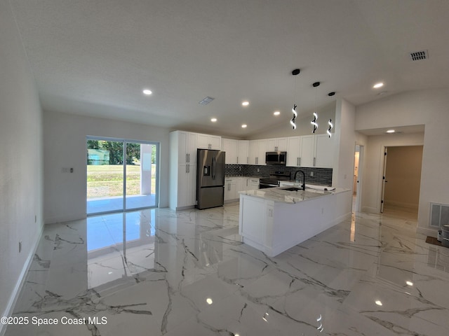 kitchen featuring a peninsula, appliances with stainless steel finishes, visible vents, and recessed lighting