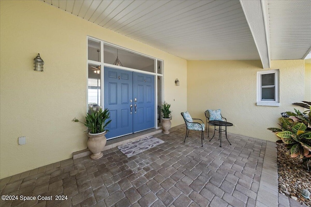 doorway to property featuring a porch