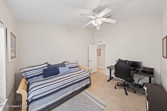 bedroom featuring ceiling fan and vaulted ceiling