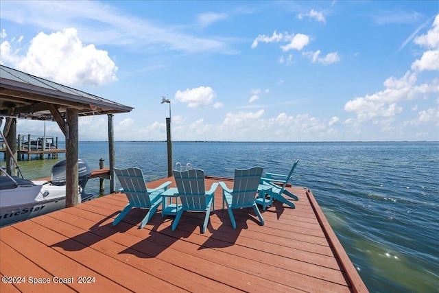 view of dock with a water view