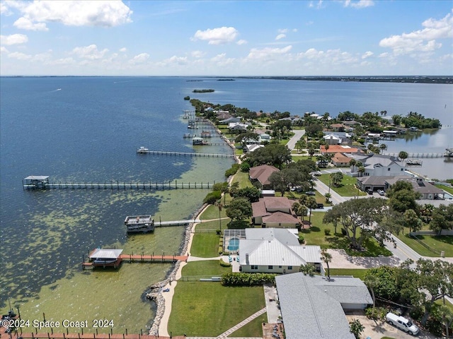 drone / aerial view with a water view