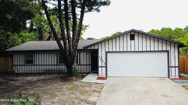 view of front of property featuring a garage