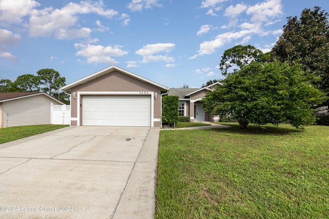 ranch-style home with a front yard