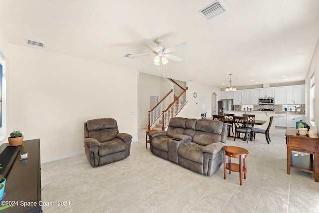 living room featuring ceiling fan