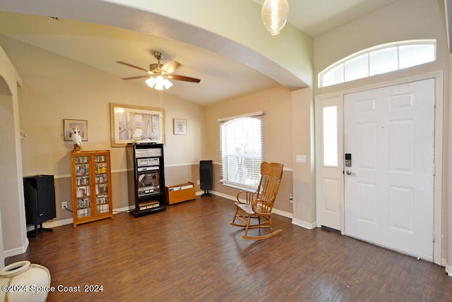 foyer entrance with lofted ceiling, dark hardwood / wood-style floors, and ceiling fan