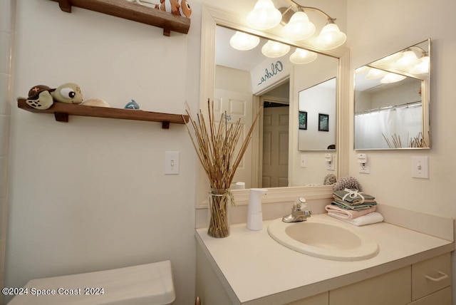 bathroom with vanity and curtained shower