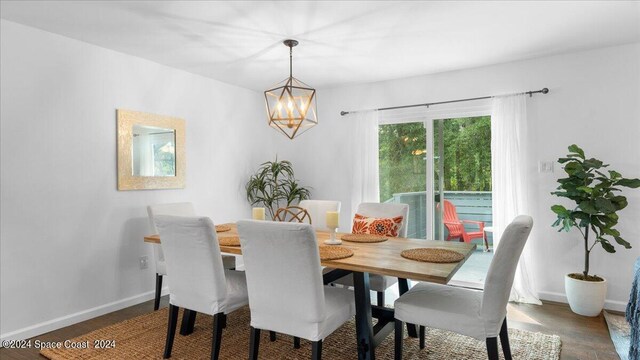 dining room with dark wood-type flooring