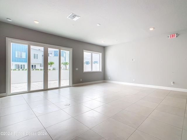 view of tiled spare room