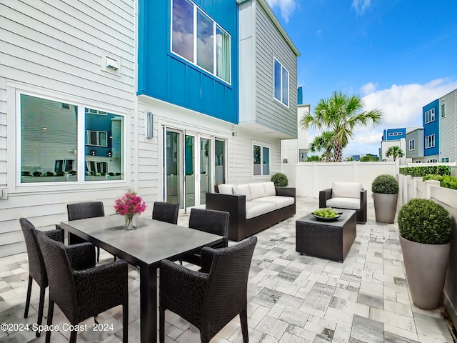 view of patio featuring an outdoor hangout area and french doors