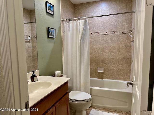 full bathroom with vanity, toilet, and shower / tub combo with curtain