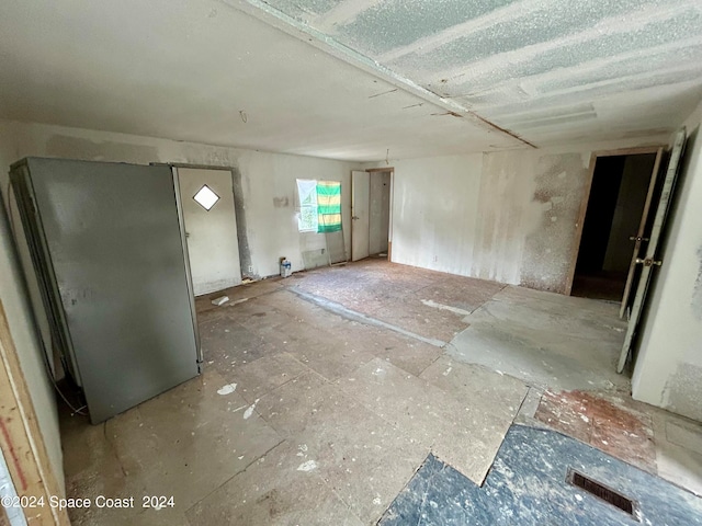 interior space with stainless steel fridge