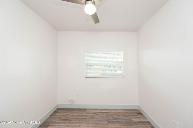 unfurnished room with ceiling fan and light wood-type flooring