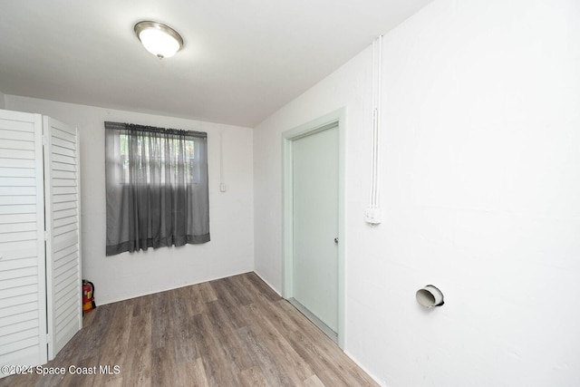 spare room featuring hardwood / wood-style flooring