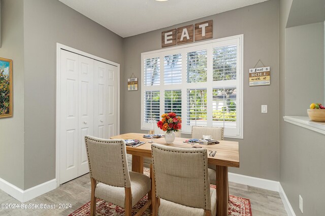 dining room featuring light hardwood / wood-style floors