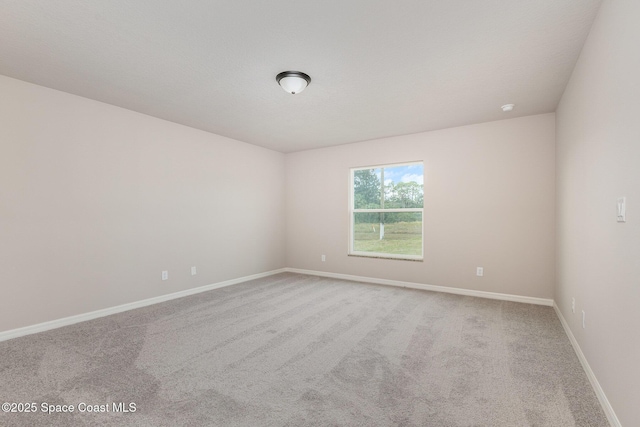 empty room featuring carpet floors